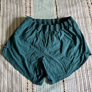 Oiselle long flyout shorts teal size 12